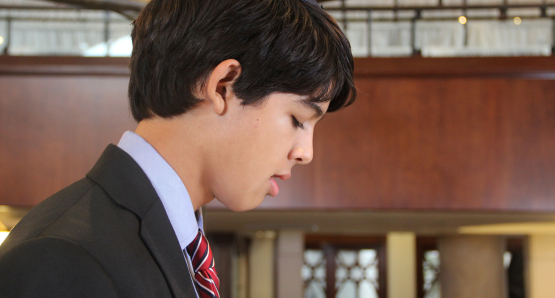 Josh (Luca Oriel) at his bar mitzvah.